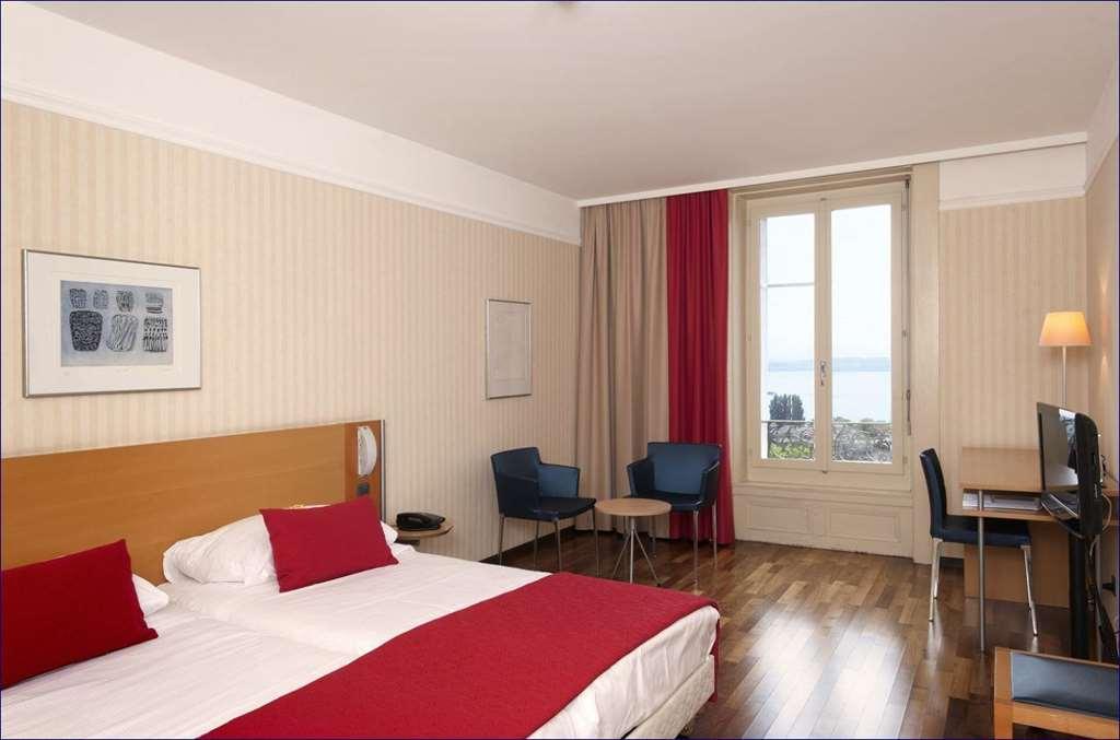 Hotel Alpes & Lac Neuchâtel Pokoj fotografie